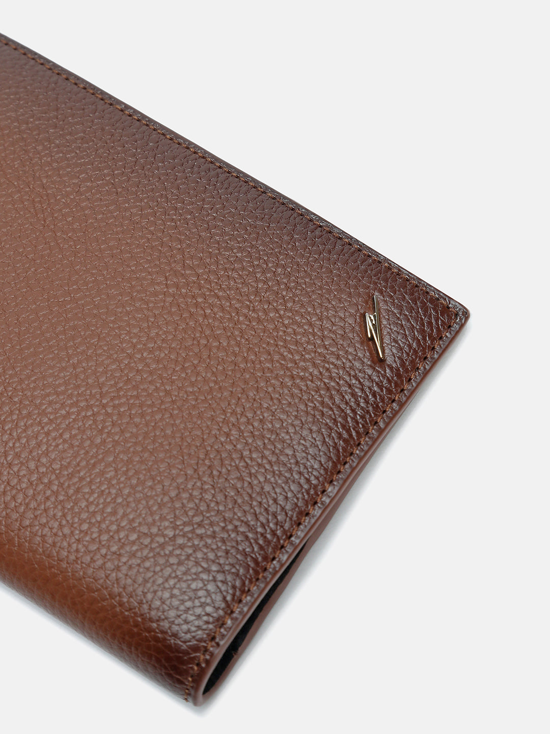 VAULT – Tan
